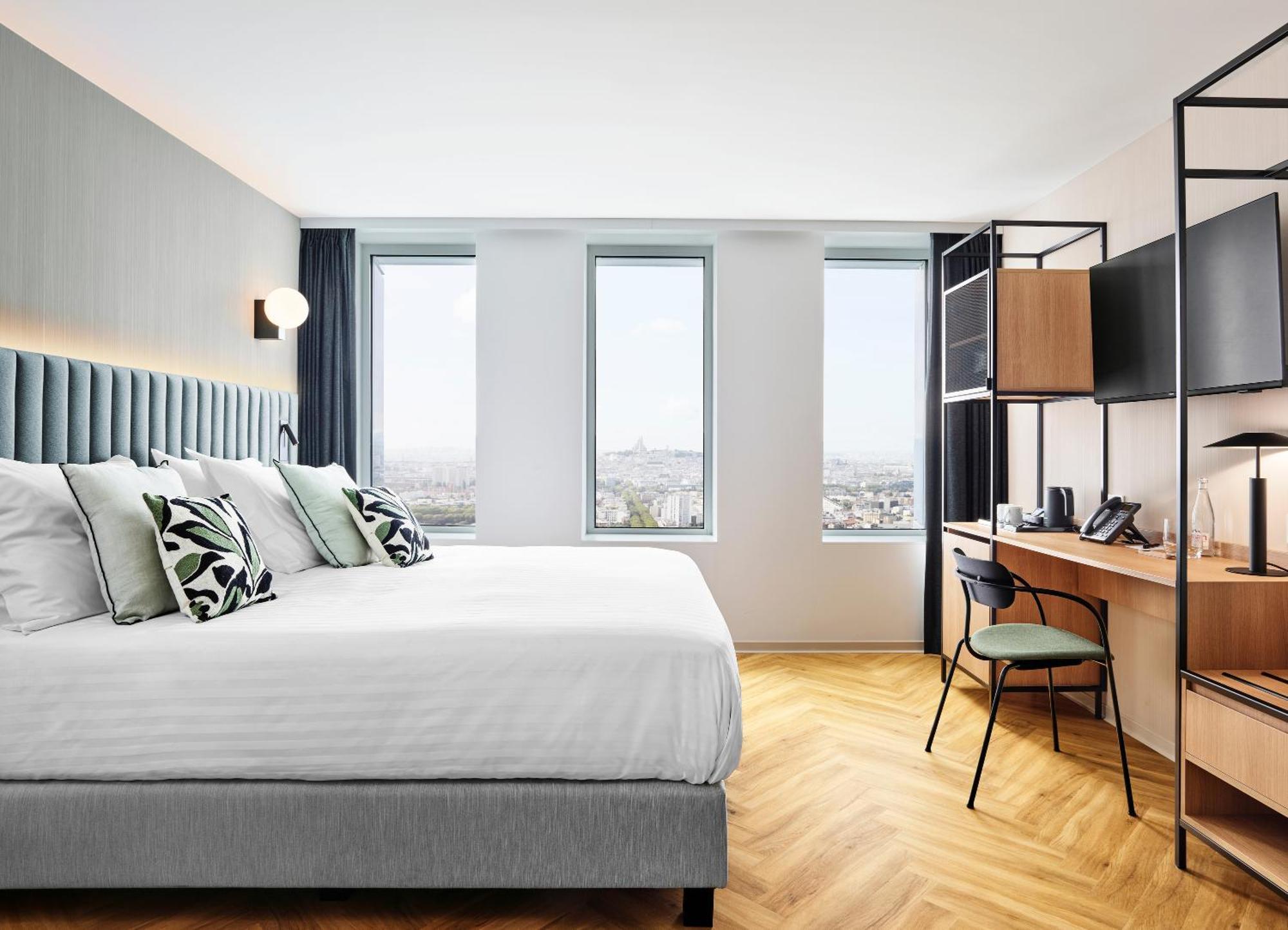 H4 Hotel Wyndham Paris Pleyel Resort Сен Дени Екстериор снимка