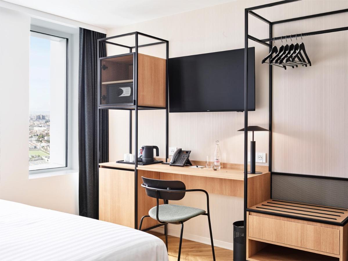 H4 Hotel Wyndham Paris Pleyel Resort Сен Дени Екстериор снимка