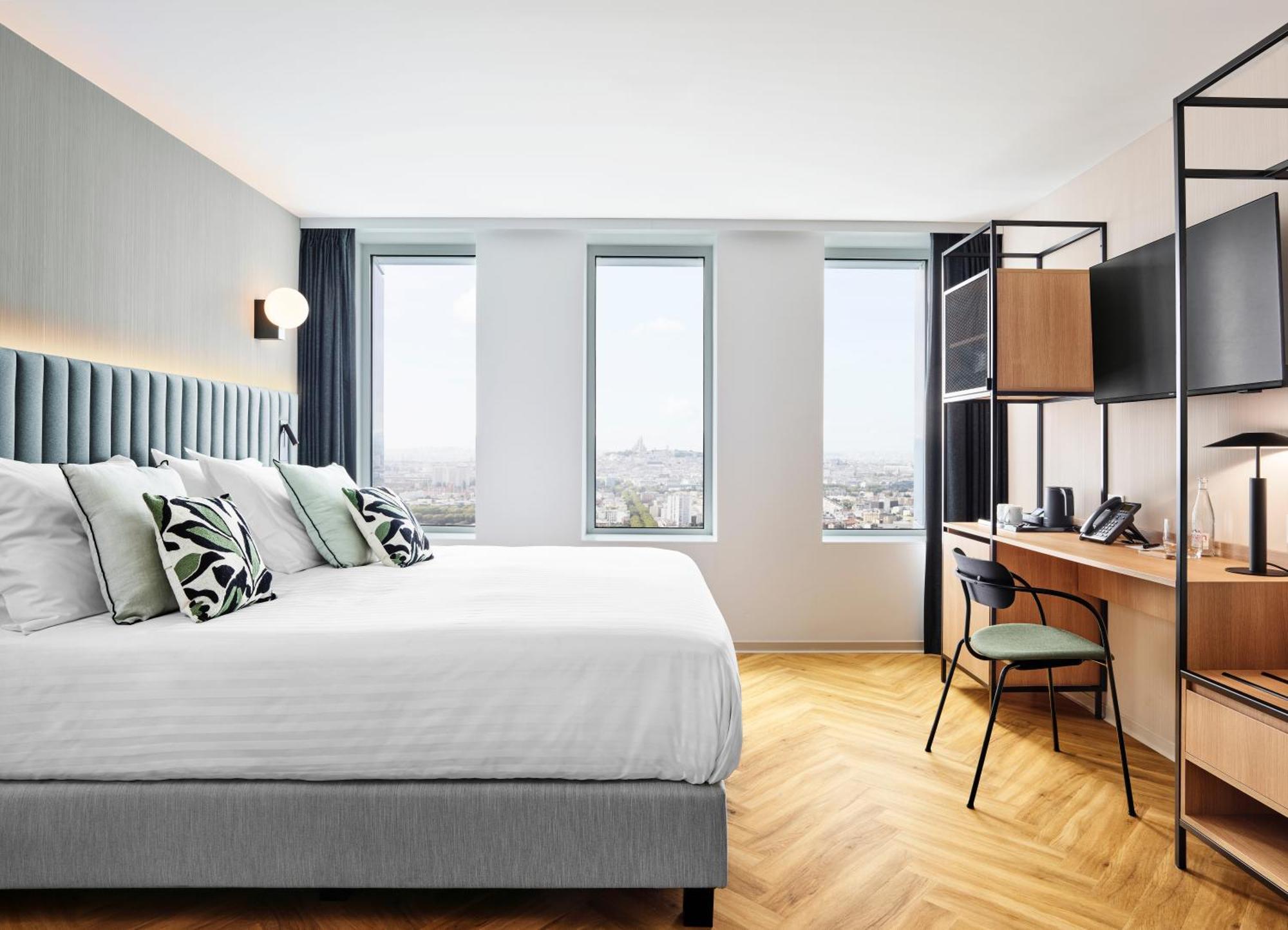 H4 Hotel Wyndham Paris Pleyel Resort Сен Дени Екстериор снимка